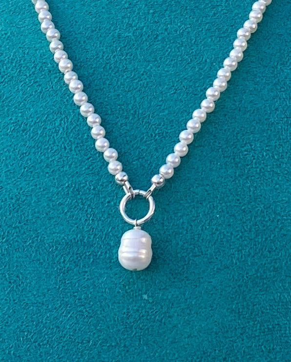 Pearls with freshwater pearl dangle