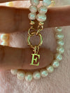 Pearl necklace with 9 carat gold designer bolt clasp and initial