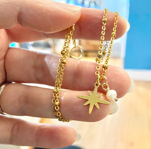 Gold North Star necklace