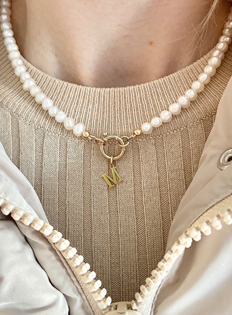 Pearl necklace with 9 carat gold designer bolt clasp and initial