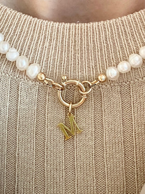 Pearl necklace with 9 carat gold designer bolt clasp and initial