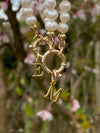 Pearl necklace with 9 carat gold designer bolt clasp and initial