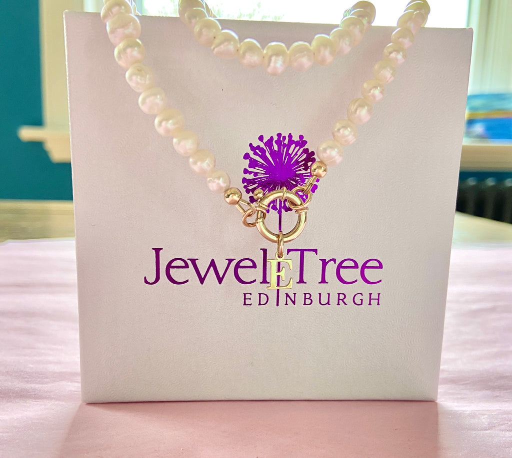 Pearl necklace with 9 carat gold designer bolt clasp and initial