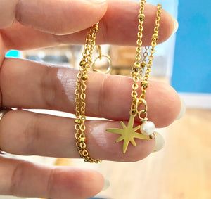 Gold North Star necklace