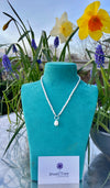 Pearls with freshwater pearl dangle