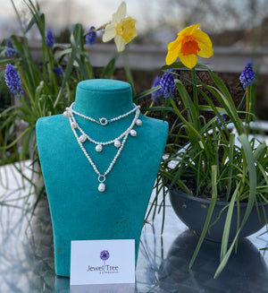 Pearls with freshwater pearl dangle