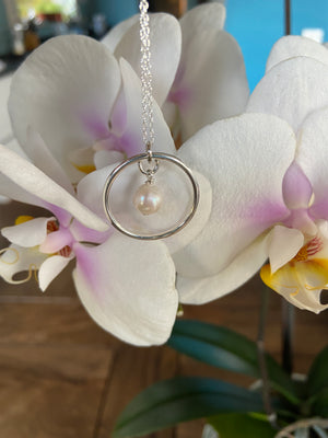 Freshwater pearl and circle of life pendant